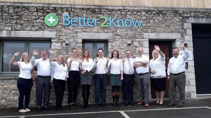 The Better2Know team outside the company's headquarters in Cumbria