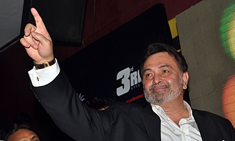 Indian Bollywood actor Rishi Kapoor gestures at the launch of Indian Bollywood actress Kashmira Shah's new calendar Kashensuous in Mumbai on March 6, 2011. AFP PHOTO (Photo credit should read AFP/AFP via Getty Images)