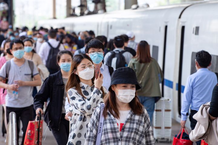 NANJING, CHINA - APRIL 30, 2020 - Passengers travel by train at the railway station. Nanjing, Jiangsu Province, China, April 30, 2020. The transportation of "May Day" holiday has reached its peak.- PHOTOGRAPH BY Costfoto / Barcroft Studios / Future Publishing (Photo credit should read Costfoto/Barcroft Media via Getty Images)