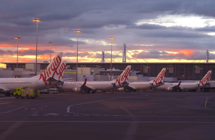 Aircraft from Australia's second largest airline, Virgin Australia, sit on the tarmac at the domestic terminal of Sydney Airport in Australia, August 19, 2018. Picture taken August 19, 2018. REUTERS/David Gray