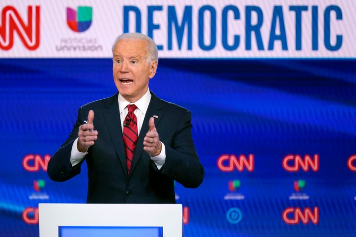 Joe Biden participates in a Democratic presidential primary debate with Bernie Sanders at CNN Studios in Washington