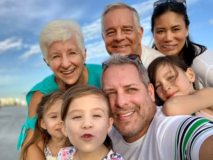 Mike Maloney and Sheila Golez and their kids, just reunited with Mike's parents to create a two-household double bubble.