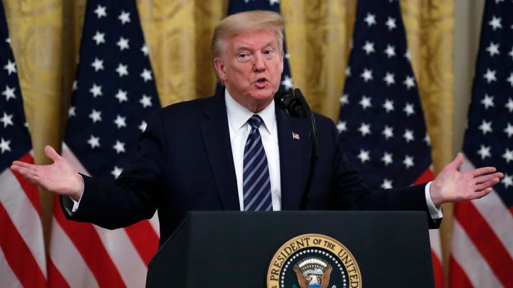 President Donald Trump answers questions from reporters during a event about protecting seniors, in the East Room of the White House, April 30, in Washington. (AP Photo/Alex Brandon)