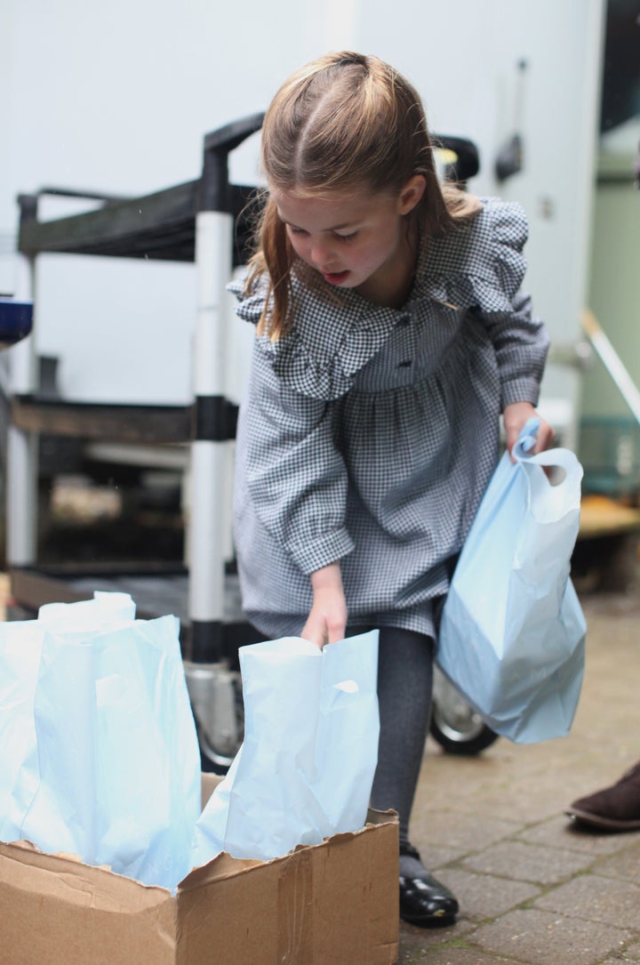 Little Charlotte helping pack!