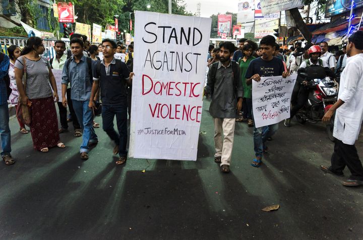 KOLKATA, WEST BENGAL, INDIA - 2016/10/17: A protest by the students of Jadavpur University against domestic violence on women has taken place in front of the main campus of Jadavpur University. Few days ago, Mita, a passed out student of Jadavpur University, passed away due to domestic violence. The students organised a protest rally called 'Justice for Mita', just after resuming their university. (Photo by Debsuddha Banerjee/Pacific Press/LightRocket via Getty Images)