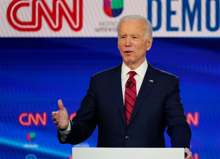 In this Sunday, March 15, 2020, photo, former Vice President Joe Biden speaks during a Democratic presidential primary debate at CNN Studios in Washington. (AP Photo/Evan Vucci)