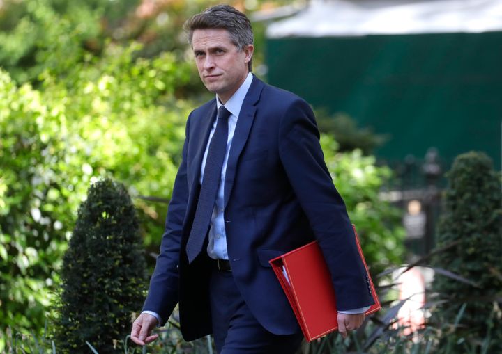 Britain's Education Secretary Gavin Williamson arrives in Downing Street in London as the country remains in lockdown due to the coronavirus outbreak, Friday, May 1, 2020. (AP Photo/Kirsty Wigglesworth)