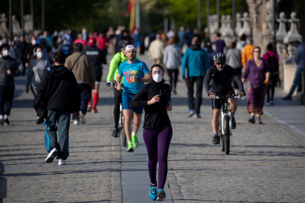 Pedestrians crossing the Toledo bridge in Madrid on Sunday. 