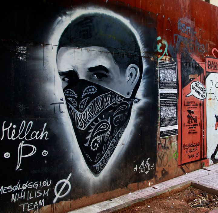 Graffiti pintado en un muro del centro de Atenas en homenaje al cantante de rap "Killah P", asesinado a puñaladas supuestamente por elementos de extrema derecha. Foto del 17 de febrero del 2014. (AP Photo/Dimitri Messinis)