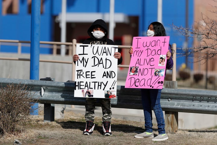 Abolish ICE Colorado, Sanctuary for All, American Friends Committee and Never Again Action take part in a car protest to call for the release of detained immigrants at the GEO Detention Center on April 3, 2020, in Aurora, Colorado. 