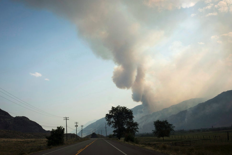 The Snowy Mountain wildfire is visible from Cawston, B.C., on Aug. 2, 2018. 