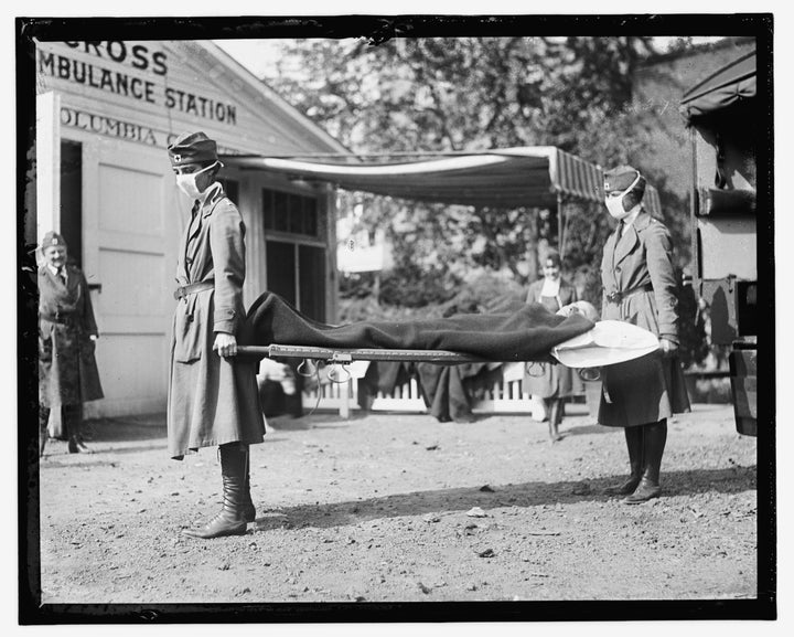 This Library of Congress photo shows a demonstration at the Red Cross Emergency Ambulance Station in Washington, D.C., during the influenza pandemic of 1918. Science has ticked off some major accomplishments over the last century. The world learned about viruses, cured various diseases, made effective vaccines, developed instant communications and created elaborate public-health networks. Yet in many ways, 2020 is looking like 1918, the year the great influenza pandemic raged. (Library of Congress Prints and Photographs Division via AP)