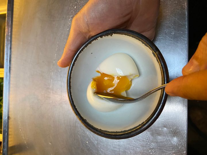 Chef Matthew Accarrino demonstrates a perfectly jammy egg, just between hard-boiled and soft-boiled.