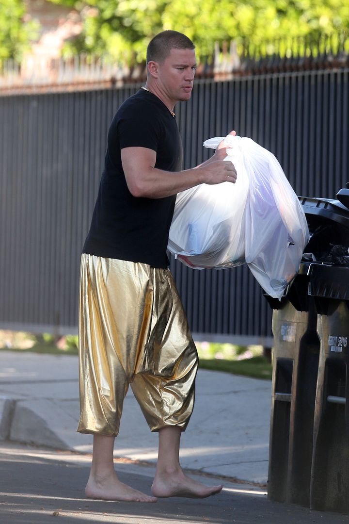 EXCLUSIVE: Barefoot Channing Tatum wears gold lamÃ© pants as he puts the trash out at Jessie J's house in Los Angeles, California. The 'Magic Mike' hunk appeared to be staying with Jessie despite reports of their breakup a few weeks ago. Wearing a black T-shirt and the bright harem-style pants, Channing channelled MC Hammer as he went about his domestic duties. He carried two large trash bags to the bins which were already bursting ready for collection.Pictured: channing tatumRef: SPL5164653 030520 EXCLUSIVEPicture by: SplashNews.comSplash News and PicturesUSA: +1 310-525-5808London: +44 (0)20 8126 1009Berlin: +49 175 3764 166photodesk@splashnews.comWorld Rights