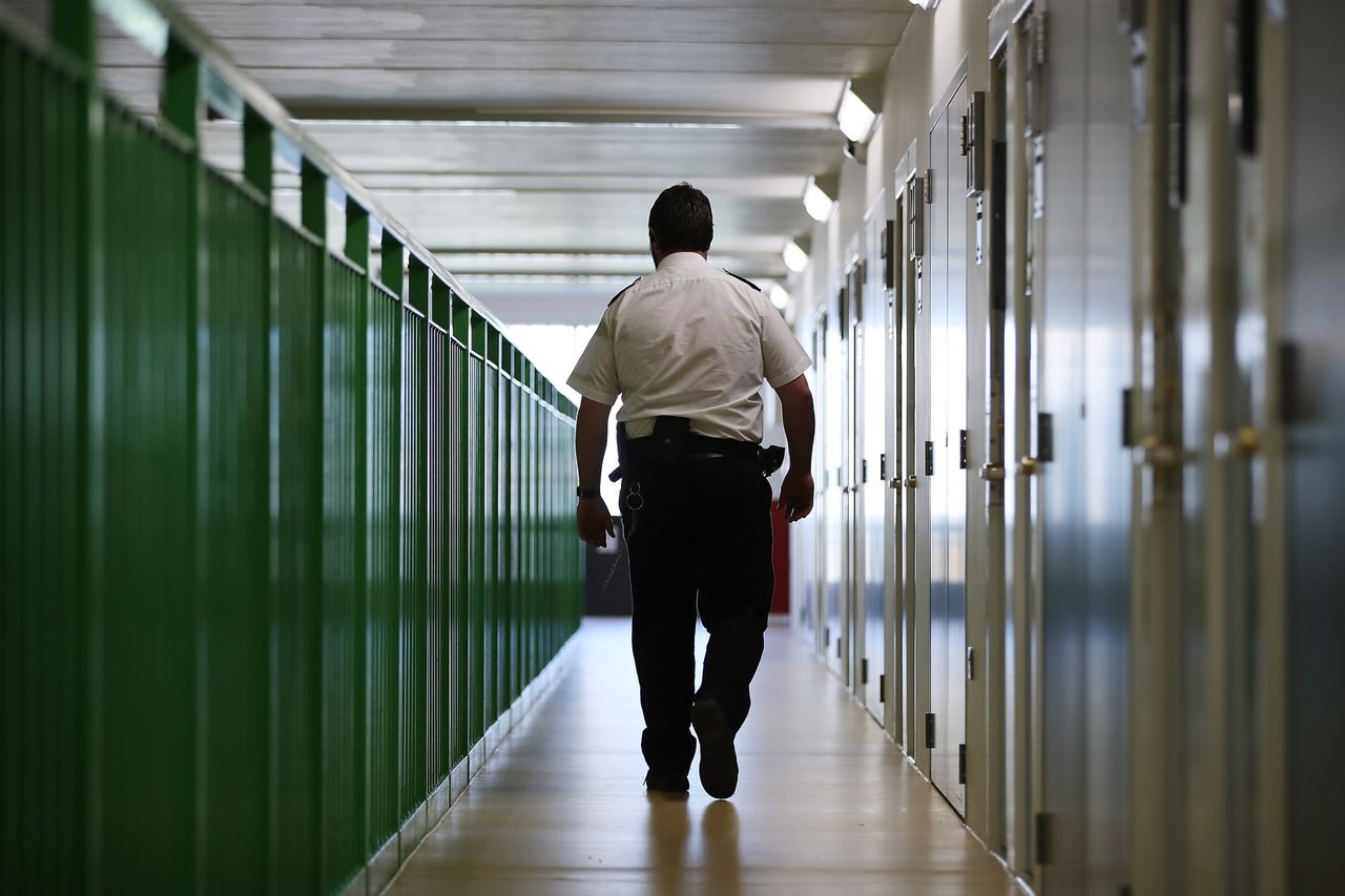 Stock image of a prison officer on duty