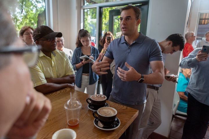 Rep. Justin Amash speaks with constituents at Rising Grinds Café in Grand Rapids on Aug. 21, 2019. 