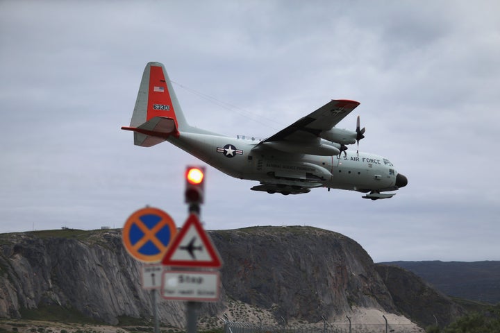 A pilot from the New York Air National Guard lands the ski-equipped National Science Foundation C-130 in Kangerlussuaq.