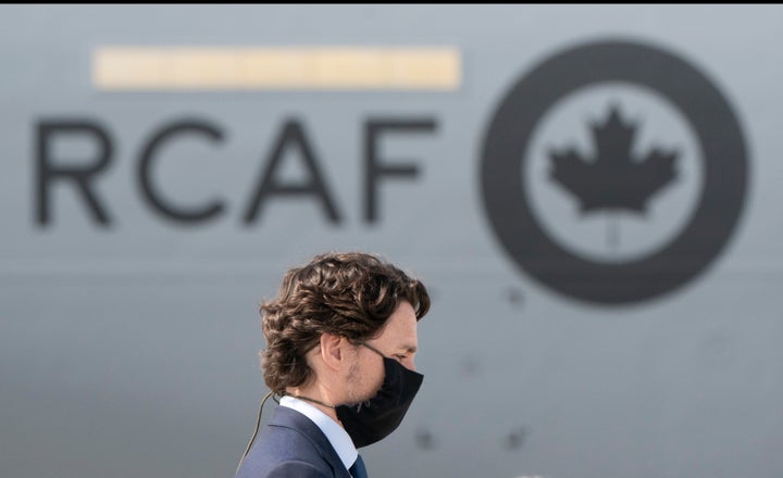 Prime Minister Justin Trudeau attends a repatriation ceremony for the six Canadian Armed Forces members killed in a helicopter crash off of Greece during Operation Reassurance, at CFB Trenton, Ont. on May 6, 2020.