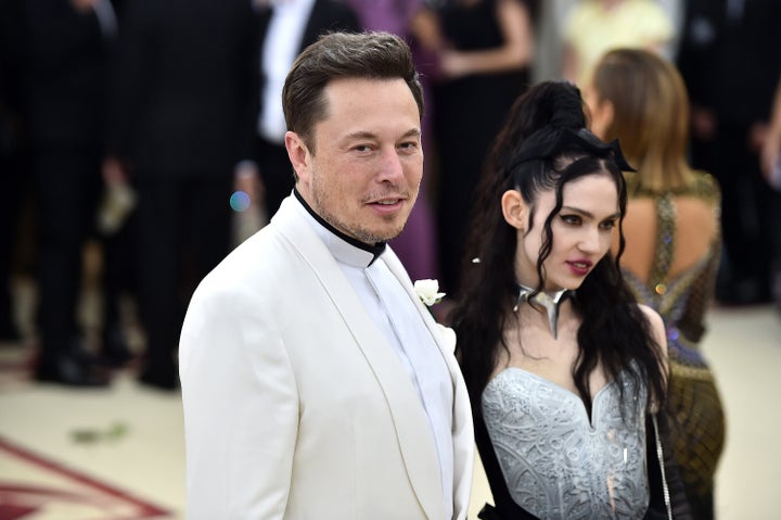 NEW YORK, NY - MAY 07: Elon Musk and Grimes attend the Heavenly Bodies: Fashion & The Catholic Imagination Costume Institute Gala at The Metropolitan Museum of Art on May 7, 2018 in New York City. (Photo by Theo Wargo/Getty Images for Huffington Post)