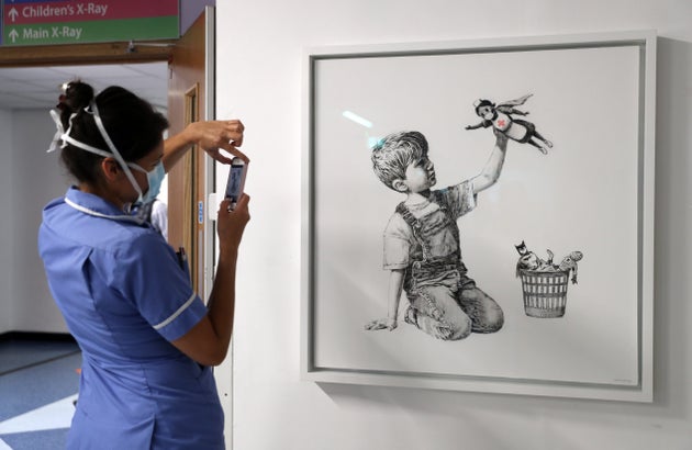 Banksy Hails Superhero Health Care Workers With Game Changer Coronavirus Art Huffpost