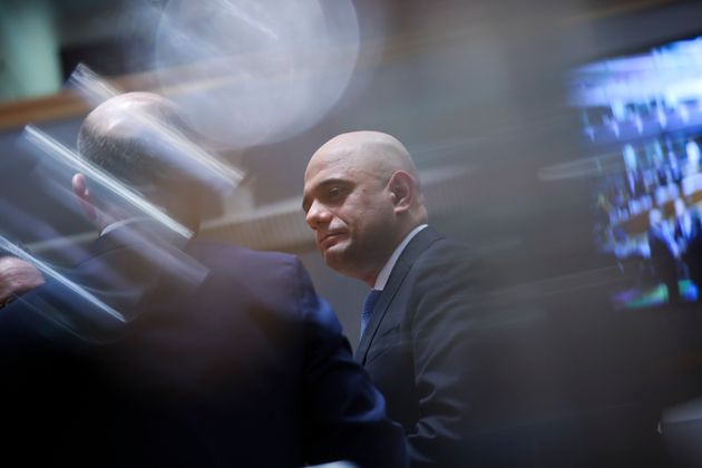 British Chancellor of the Exchequer Sajid Javid talks to German Finance Minister Olaf Scholz during an European Finance Ministers meeting at the Europa building in Brussels, Tuesday, Jan. 21, 2020. (AP Photo/Francisco Seco)