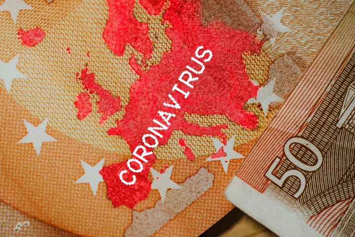 The European Union map on a euro banknote, with red infected areas of Coronavirus