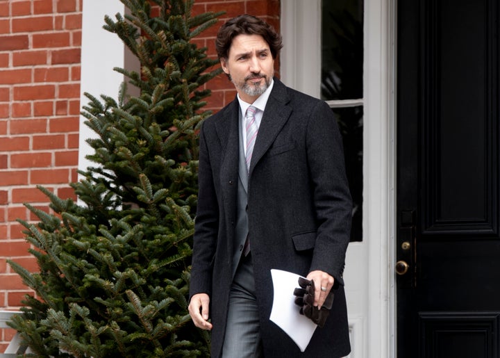 Prime Minister Justin Trudeau steps out of Rideau Cottage for a daily briefing with the media in Ottawa on May 8, 2020.