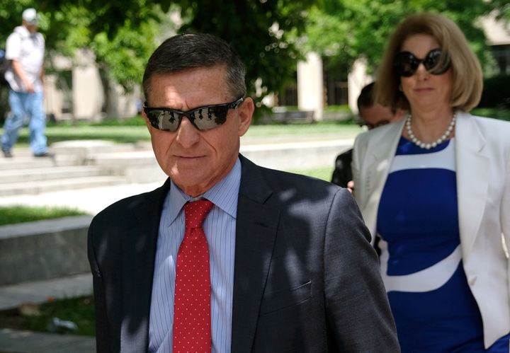 Former national security adviser Michael Flynn, accompanied by his then-new lawyer Sidney Powell, leaves the E. Barrett Prettyman U.S. Courthouse on June 24, 2019, in Washington, D.C.