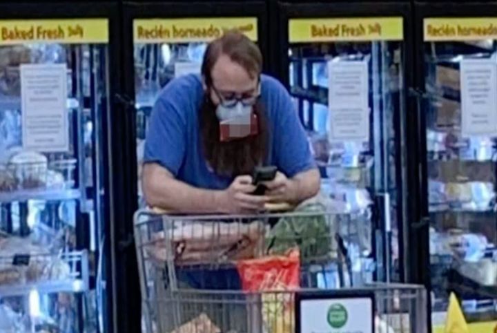 A man wears a swastika mask in a Santee, California, grocery story on May 7, 2020, in this blurred-out screenshot from an NBC affiliate's news report.