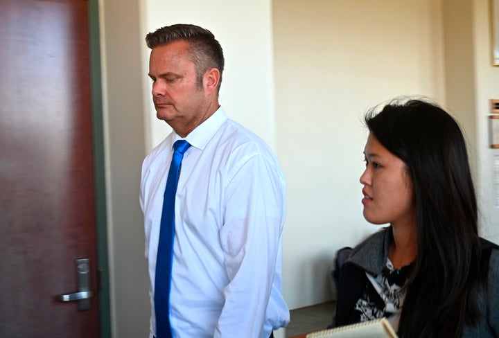 Chad Daybell, Lori Vallow's current husband, walks into court for his wife's hearing on child abandonment and other charges in Hawaii in February. Vallow was later extradited to Idaho.