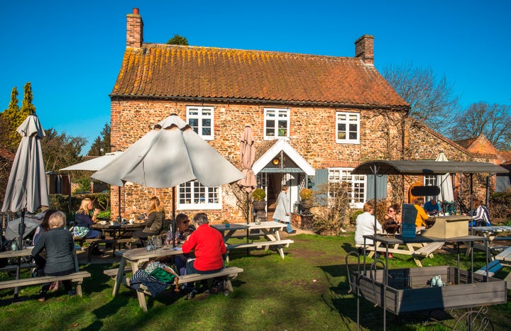 Pubs could reopen in summer if they are able to observe social distancing.