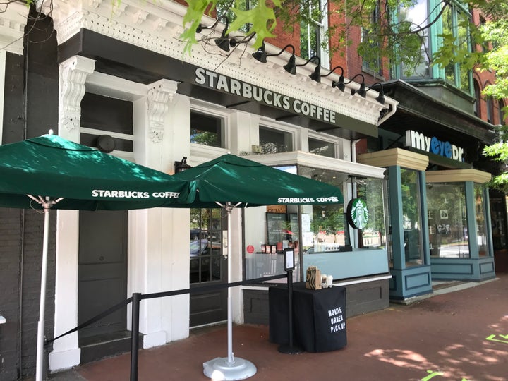 A Starbucks in southeast Washington, D.C. where customers can pick up drinks outside. Tape marks off where to stand so people are properly distanced.