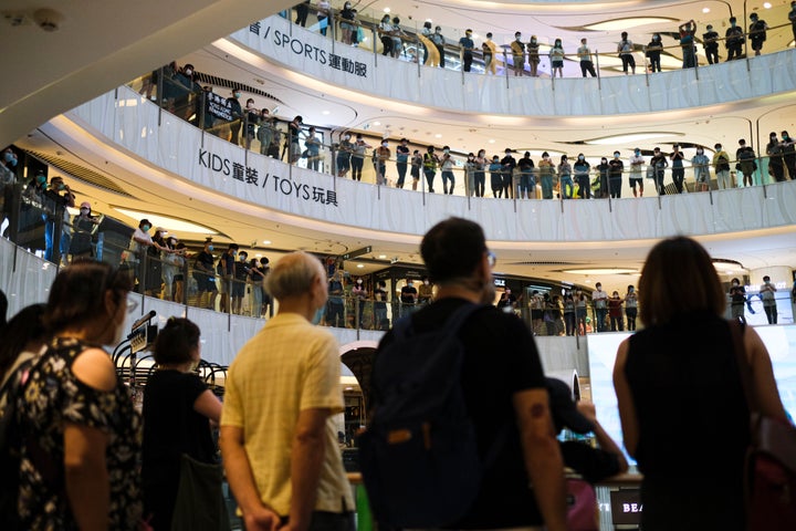 Protesters attend a flash mob gathering in a shopping mall during Mother's Day.