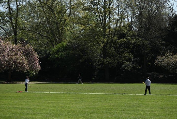 People playing a game of tennis in Battersea Park, London, as the UK continues in lockdown to help curb the spread of the coronavirus.