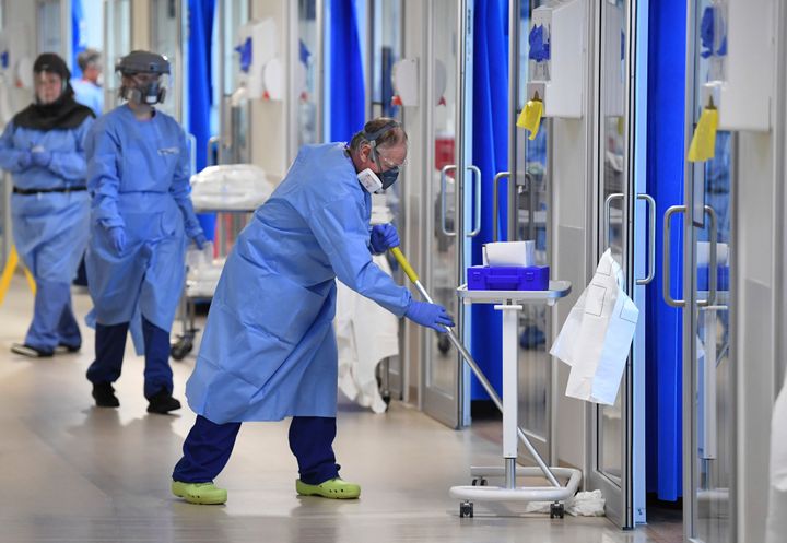 Clinical workers in PPE clean the intensive care unit at the Royal Papworth Hospital in Cambridge