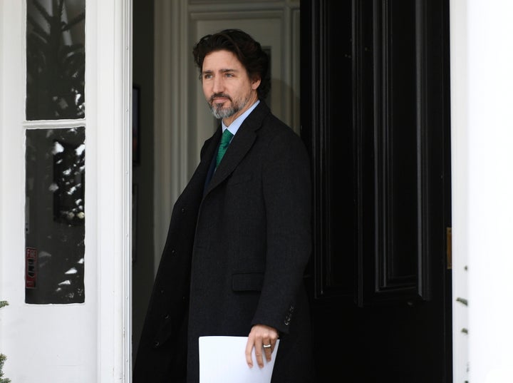 Prime Minister Justin Trudeau arrives for his daily news conference on the COVID-19 pandemic outside his residence at Rideau Cottage in Ottawa on May 11, 2020. 