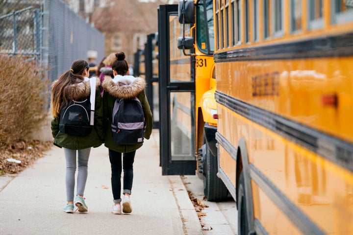 High school students leave Beal Secondary School in London, Ont. on March 13, 2020, the last day of classes before provinces shut down schools to slow the spread of COVID-19.