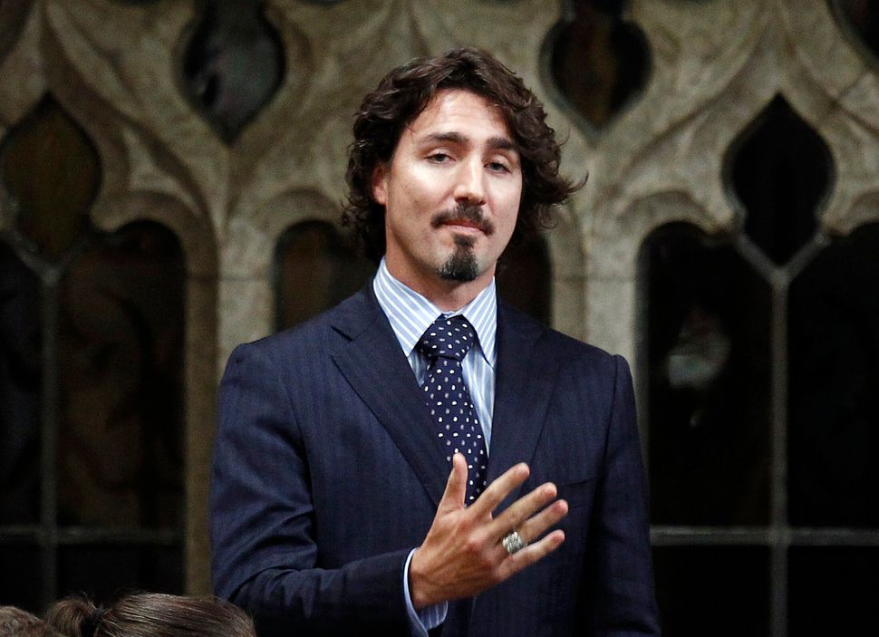 Justin Trudeau speaks following Question Period in the House of Commons on Parliament Hill in Ottawa on December 14, 2011. 