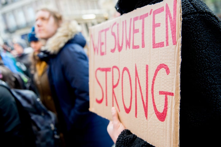 A sign that says "Wet'suwet'en strong" appears at a demonstration in London on March 1, 2020. Solidarity protests have popped up in the U.K., U.S. and across Canada over the issue of Indigenous rights.