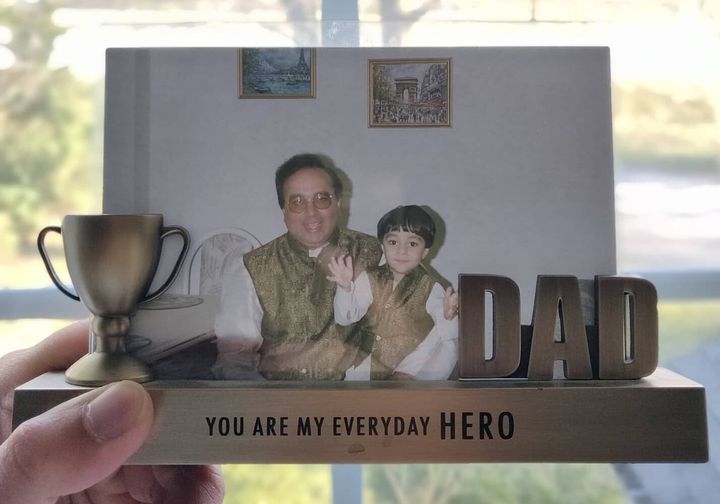 A picture of the author with his dad in the 1990s.