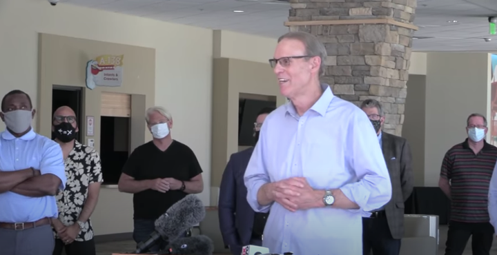 Pastor Dan Carroll and other pastors gather at Water of Life Community Church in Fontana, California, on May 7, for a press conference announcing their plans to reopen this month.