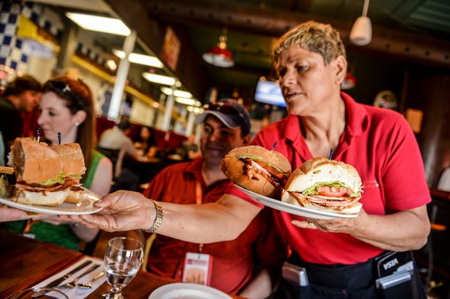 Peameal bacon sandwiches are served during a food tour in Toronto.