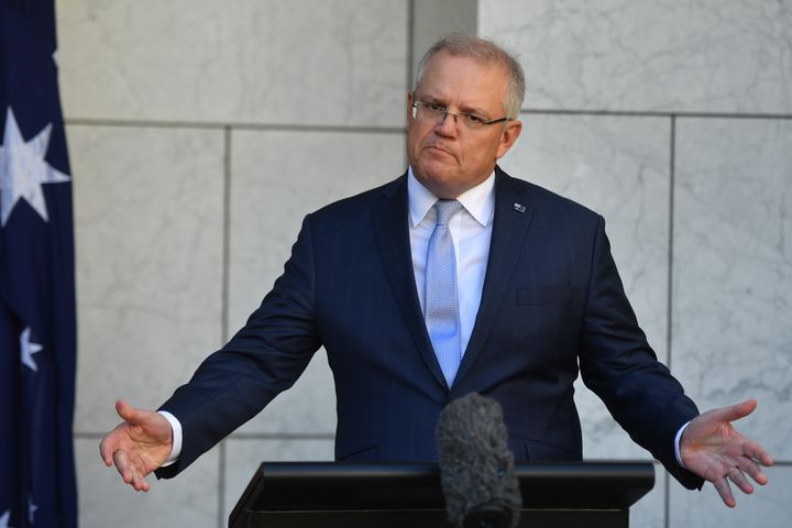 CANBERRA, AUSTRALIA - MAY 14: Prime Minister Scott Morrison reacts during a press conference in the Prime Ministers Courtyard at Parliament House on May 14, 2020 in Canberra, Australia. Australia's unemployment rate has recorded its biggest monthly rise ever, as 594,300 people lost jobs in April as coronavirus (COVID-19) restrictions shut thousands of businesses around the country and affected many more. The official jobless rate published by Australian Bureau of Statistics (ABS) has now climbed to 6.2 per cent. (Photo by Sam Mooy/Getty Images)