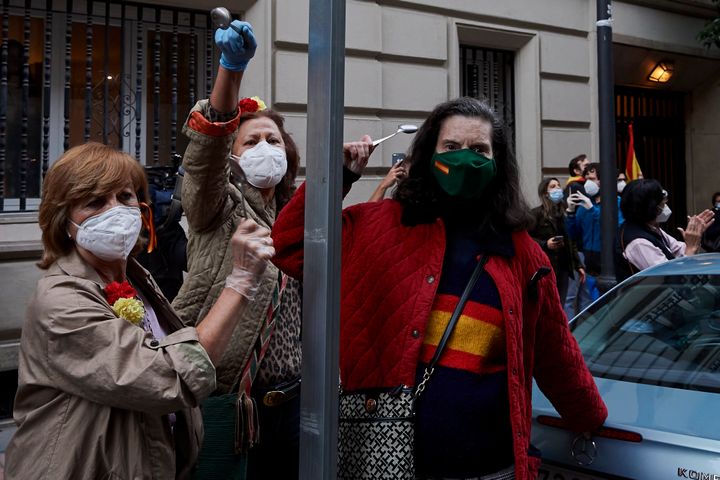 A group of women join a protest in Madrid, Spain, against the government's management of the coronavirus crisis on May 13