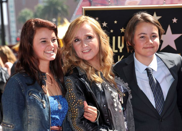 Melissa Etheridge (C) posing with her son Beckett (R) and her daughter Bailey during her Walk of Fame ceremony held at the Hard Rock cafe in Hollywood in 2011.