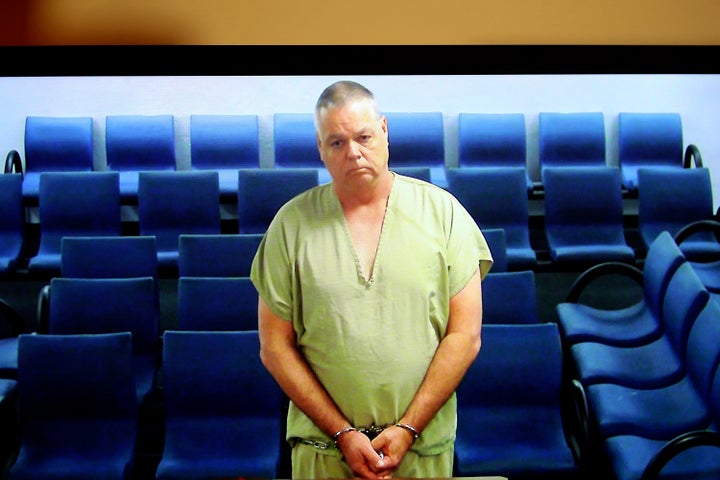 Former school resource officer Scot Peterson, seen at the Broward County Main Jail in Fort Lauderdale, was arrested on c