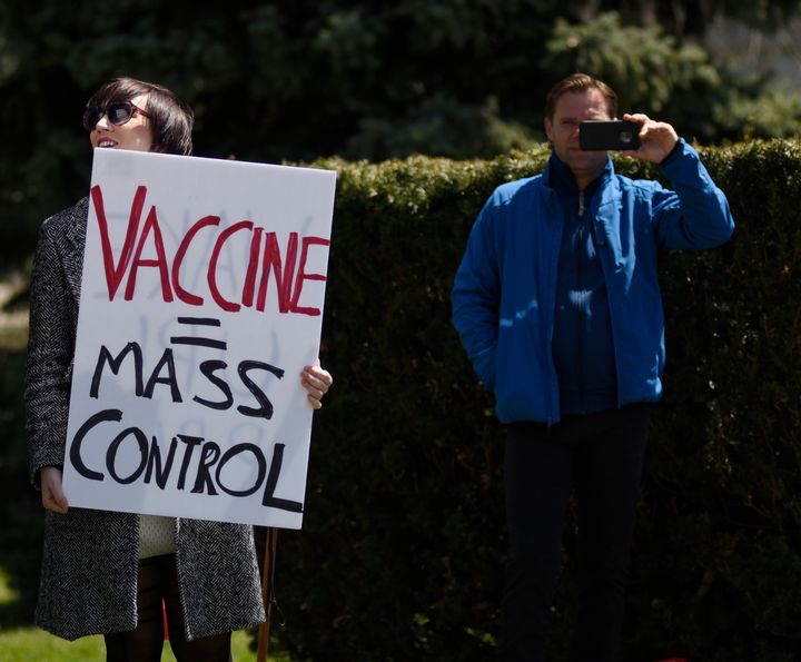 An anti-vaccine protester in Toronto, Canada, during a rally against social distancing.