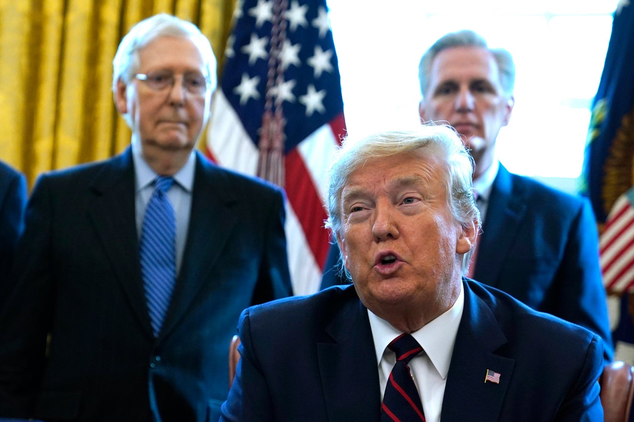 President Donald Trump and Senate Republican leader Mitch McConnell (far left) publicly oppose relief funding for states as they face budget shortfalls caused by the coronavirus pandemic.