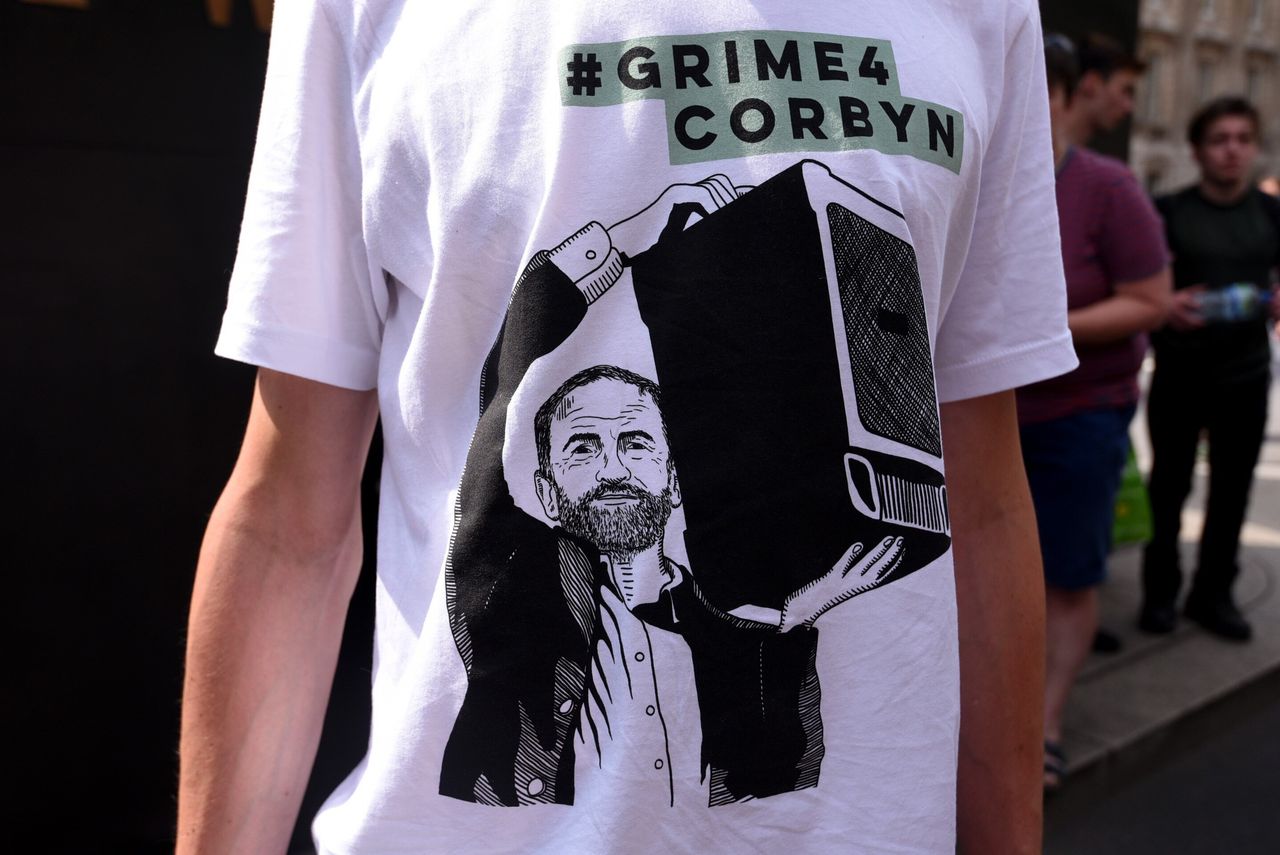 A Labour supporter wears a #Grime4Corbyn T-shirt