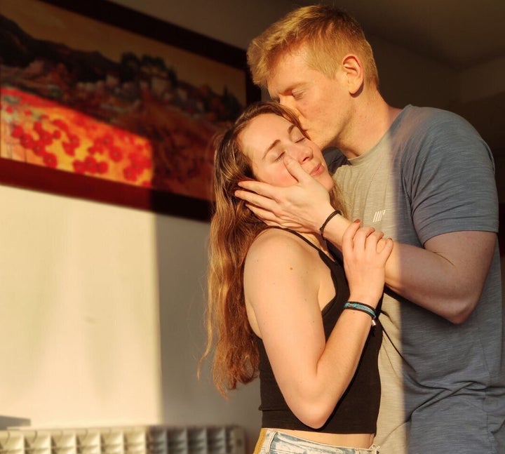 The author and her boyfriend, Julien, in her apartment in Alsace, France, last month.